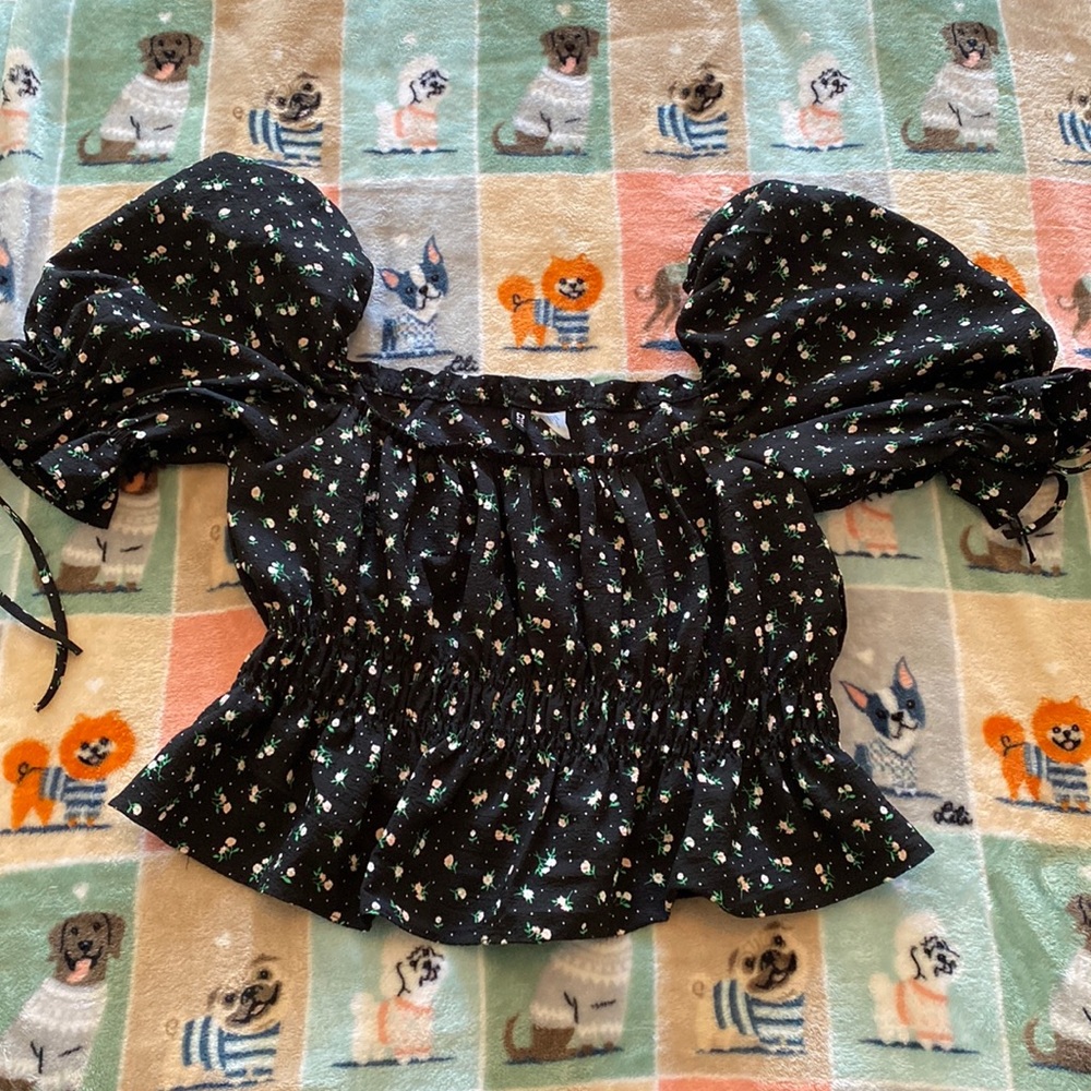 Blouse from H&M- Size Medium- a floral design with puffy sleeves
